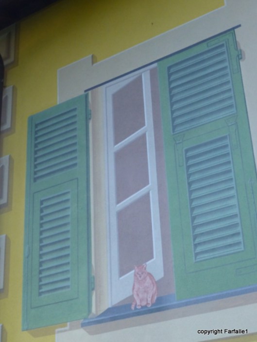 The false window is original, the false Luciano is not.  Photo by Hilary Hatch.