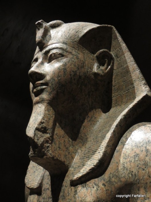 head of seated figure