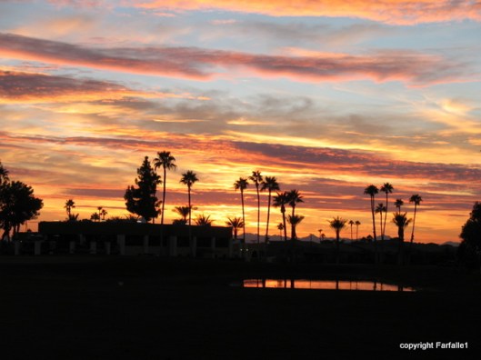 sunset over painted mountain golf course
