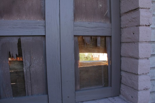 Superior House Tour boarded door peek