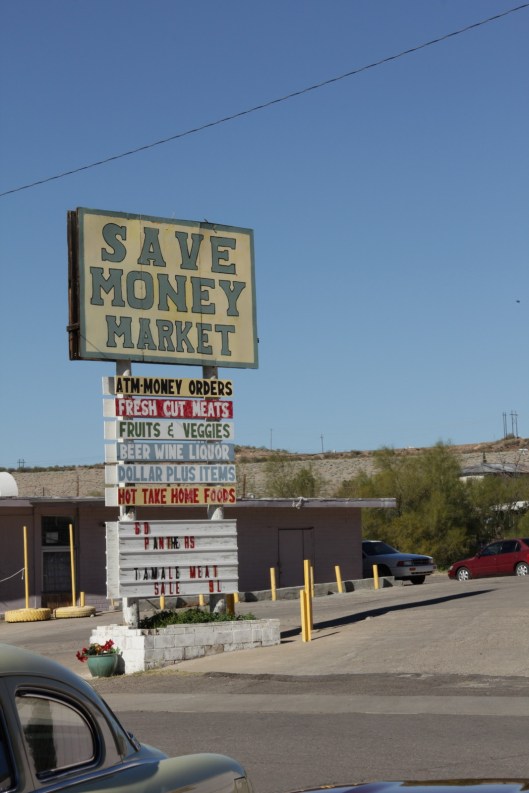 Superior House Tour Save Money Market sign