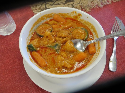 goat and rice balls in peanut soup